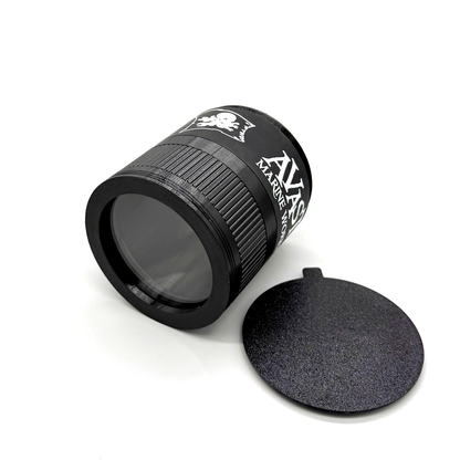 Black monocular with a brand logo on a white background. Porthole Mark II Lower Lens Assembly Hero Image