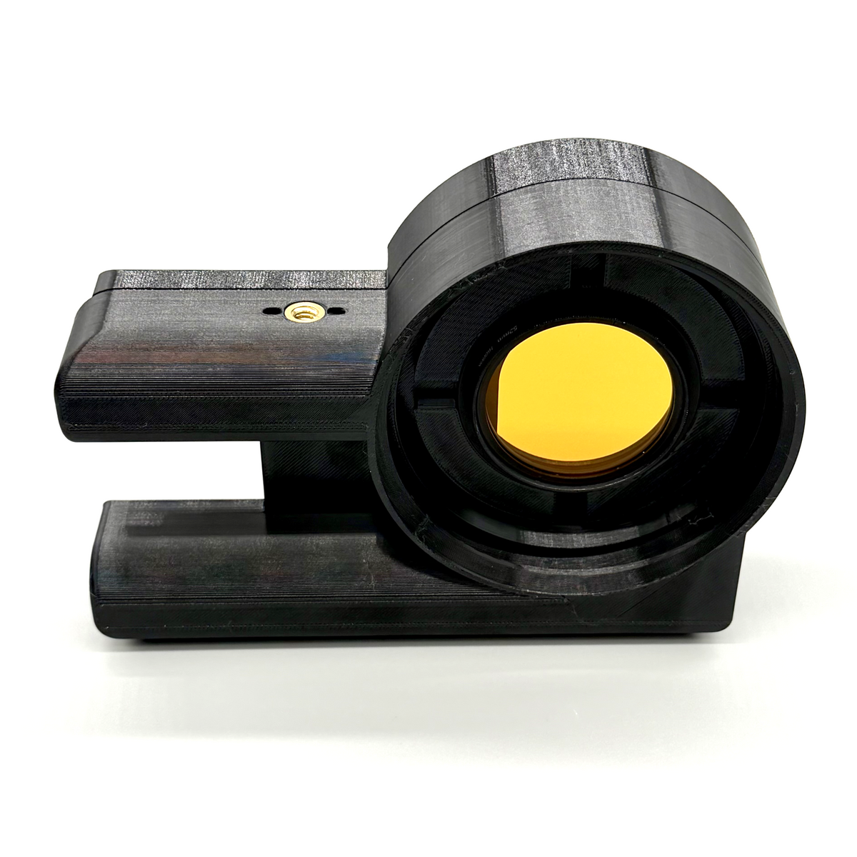 Mechanical component with a yellow center on a white background