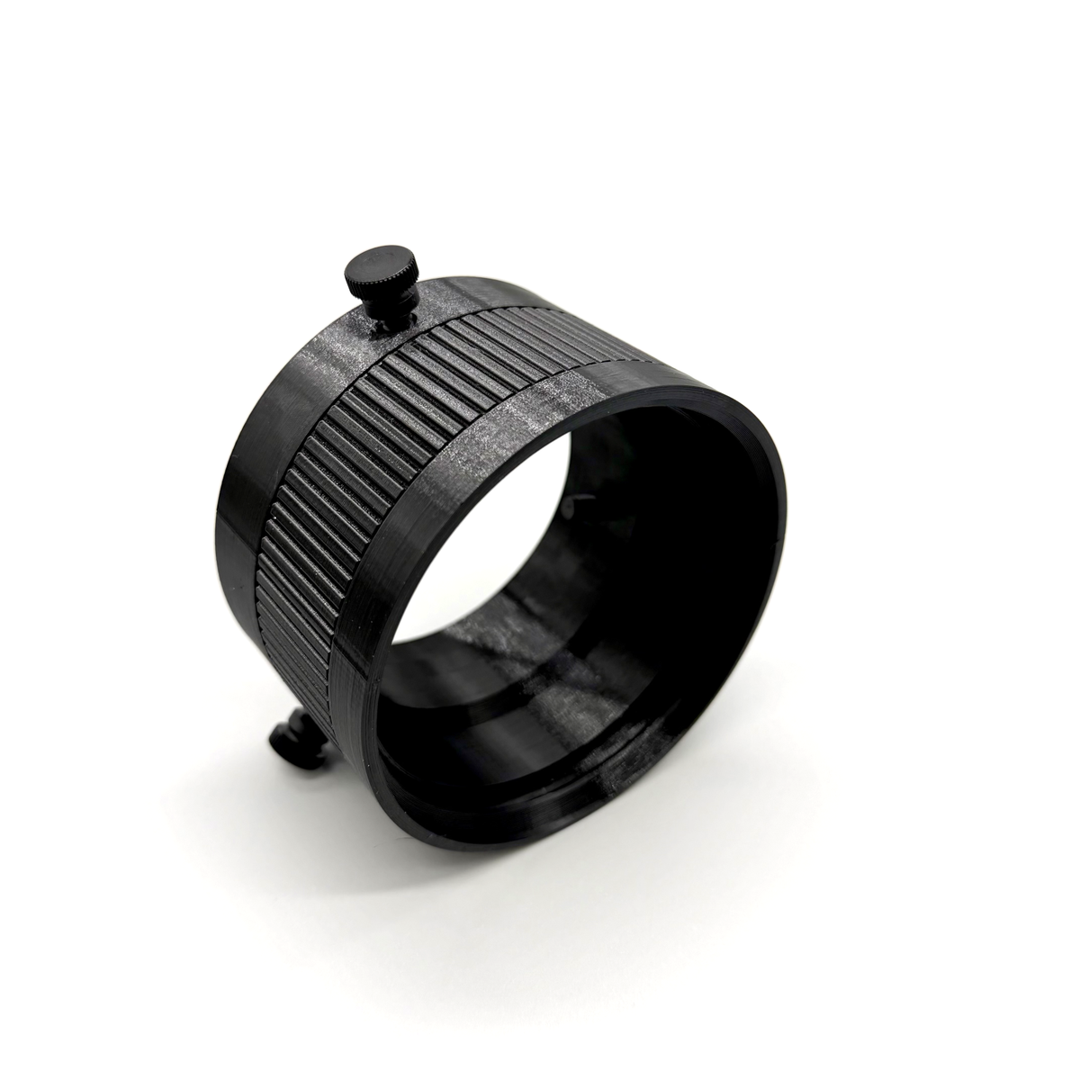 Black metal ring with a textured surface on a white background. Porthole Mark II Studio Upper Assembly