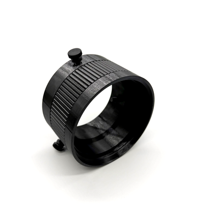 Black metal ring with a textured surface on a white background. Porthole Mark II Studio Upper Assembly