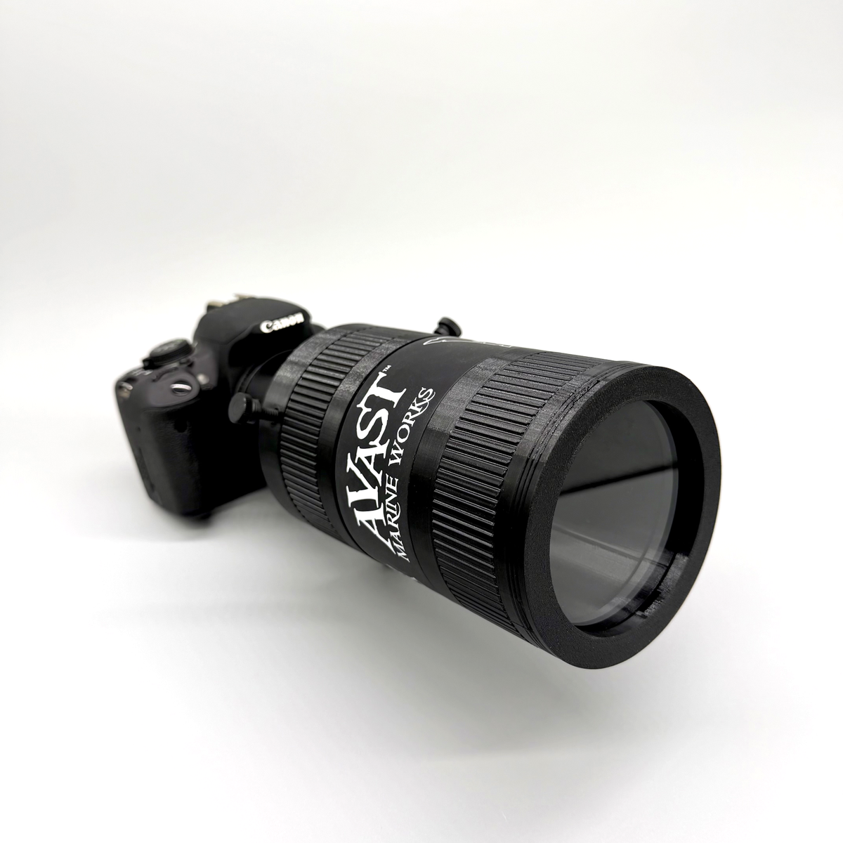Avast Marine Porthole Studio for DSLR. 3D-printed underwater coral and fish photography gear. Black camera lens with accessories on a white background. 