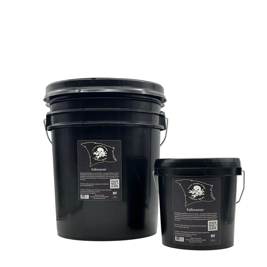 Two black plastic buckets with labels, one larger and one smaller, presumably containing calcium hydroxide for use in aquarium filtration systems.